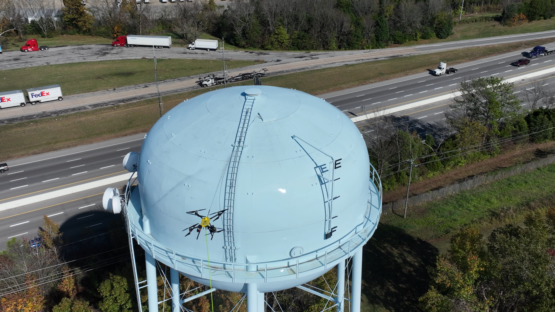 Drone Cleaning a Water Tower
